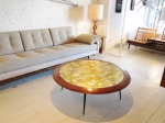 Spectacular circular coffee table with a mosaic of gilded tiling and solid Brazilian Rosewood edging on fine metal legs.
Circa : 1960
Condition: Fully restored