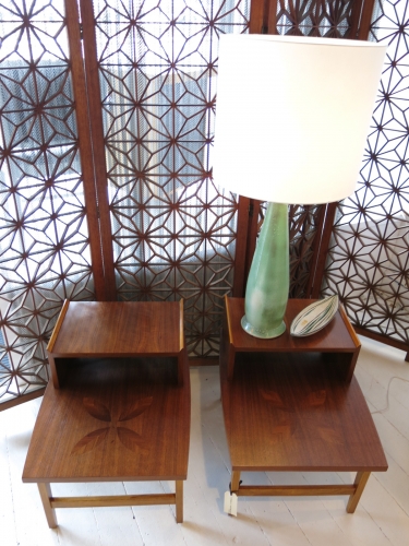 Pair of tiered side tables with leaf inlay to surface USA 1950