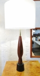 Lovely sculpture formed lamp with new shade and wiring
Walnut & with metal base
By Laurel