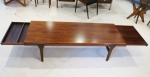 Coffee table in Brazilian Rosewood with concealed drawer at one end and extension leaf at the other
Origin : Denmark
Condition: Fully restored