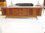 Low sideboard with carved details to front
American: circa 1960
Fully restored 
Walnut