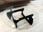 Large scale coffee table 
New toughened glass top 
on 2 x Noguchi style ebonised timber bases.
1200 mm diameter