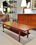 Danish coffee table in teak
with useful under-shelf.
Fully restored condition